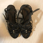 Black strappy heels from Balanciaga with house staple studs