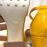 TOD’S mustard yellow open toe patient heels preowned has a small mark on the left shoe otherwise goo