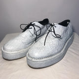 Barny Nakhle white lace up cracked leather creepers with stripping paint detail and platform sole
