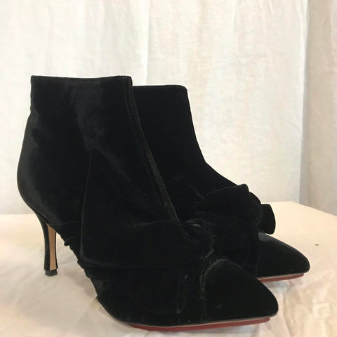 Black velvet heel from Charlotte Olympia with metal zip