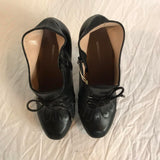 Black leather heels by Nicholas Kirkwood completely unworn